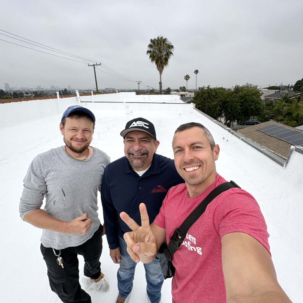 Golem Roofing crew on the completed Long Beach apartment building roof restoration project.