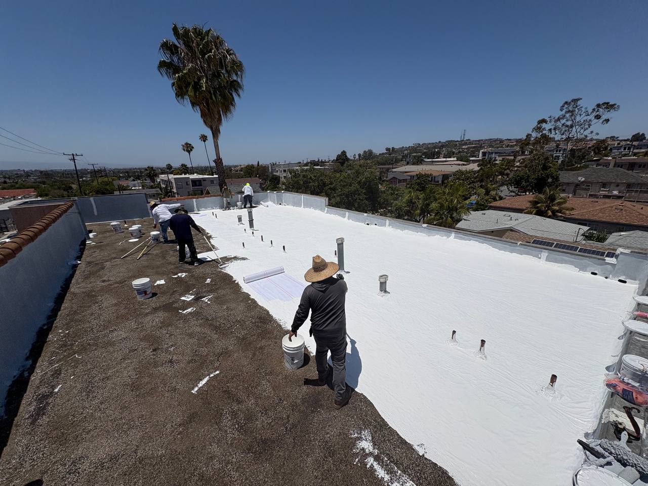 Golem Roofing apartment building roof restoration team in Long Beach