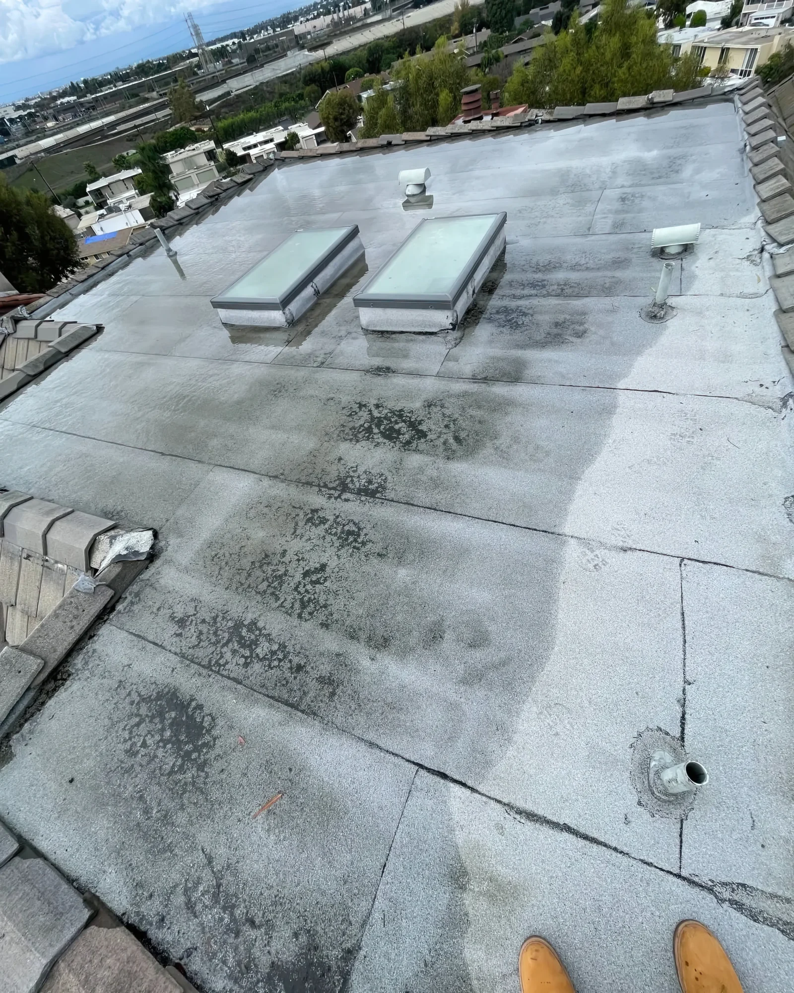 Flat Roof Leak Repair — Multi-Level Building Solution — photo 2 of 10