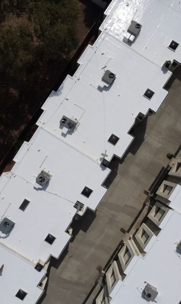 Written report or documentation screenshot for commercial hoa apartment building roofing.