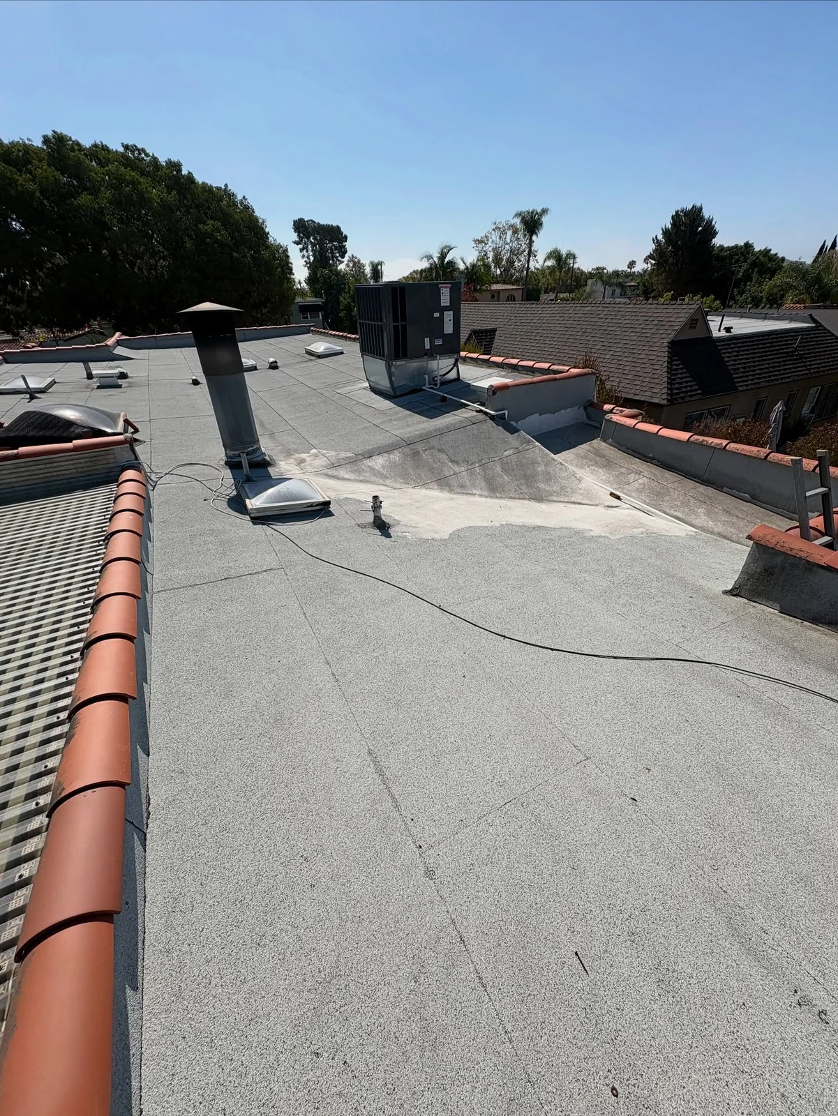 Long Beach Flat Roof Restoration: A Complete Silicone Roofing System — photo 2 of 11