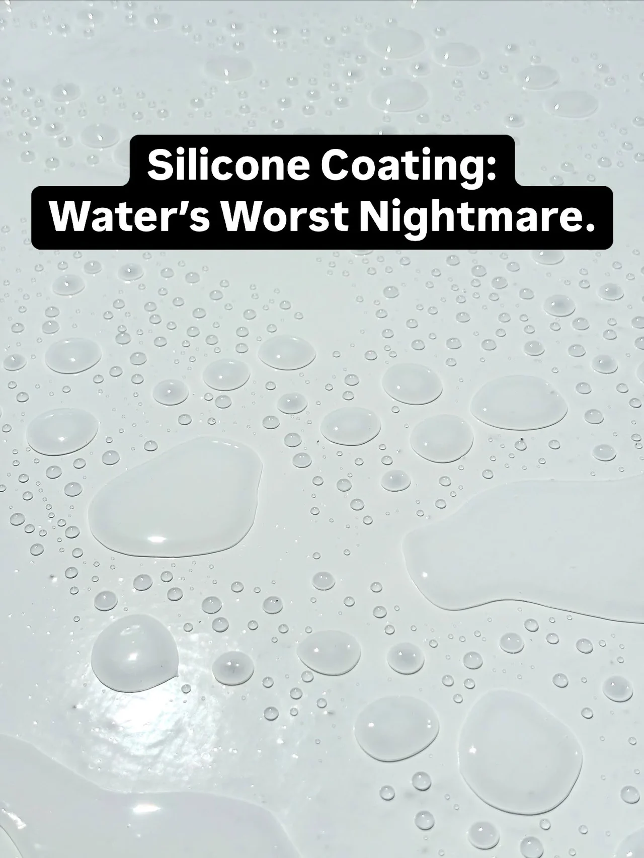 Water beads on white silicone roof coating beneath the words Silicone Coating: Water’s Worst Nightmare